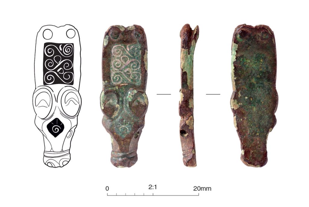 The copper alloy strap end from Halesworth Suffolk, shown from both sides and a profile. The decoration is displayed in a line drawing alongside.